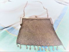 "Antique Victorian German Silver Chain Mail Handbag. Hefty Clunky Handbag measures approx. 6 1/4\" - extra 7\" with chain handle - by 6 1/4\" wide ornate frame. Marked G. SILVER inside frame. Good Condition. Excellent Example of Chain Mail Handbag." Coin Store, Love Token, Top Handle Bags, Ornate Frame, Chain Mail, German Silver, Silver Coins, Antique Victorian, Purses And Handbags