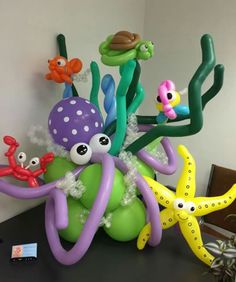 an inflatable octopus and other sea creatures on a table