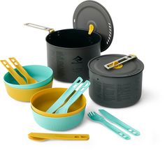 an assortment of cooking utensils and pots