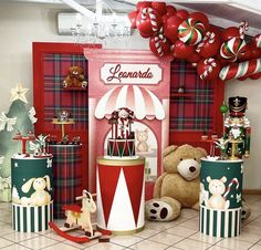 there are many christmas decorations on display in this room with teddy bears and other items