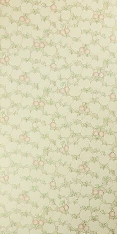 an old wallpaper pattern with green and pink flowers on it's surface,