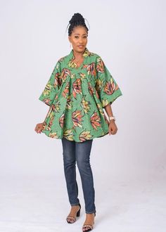 Fierce and feminine , this Ankara top has a unique in a relaxed, easy fit, oversize fit.You'll love how well it pairs with jeans and leggings bringing the high fashion drama you crave. V-neclline Short flared sleeves Cool iron as needed Pullover style Split-neck tunic Ankara Flare Tops, Ankara Blouses For Women, Ankara Tops With Jeans, Ankara Blouses, Ankara Blouse, Kitenge Fashion, Ankara Tops, African Print Tops, Flare Top