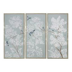 three panels with white flowers and birds on them, hanging in front of a wall