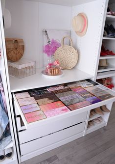 a white closet filled with lots of different items