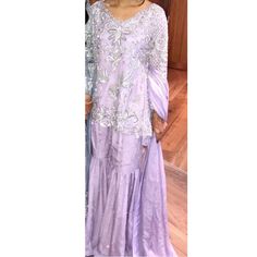 Comes With Extra Trousers, Gharara, Dupta And Top. Embroidery In Front And Back With Full Pearl On Duptta And Gharara. Perfect Wedding Guest Outfit. Traditional Drape Purple Palazzo Set For Wedding, Purple Traditional Drape Palazzo Set For Wedding, Floor-length Chikankari Embroidery Sharara, Purple Floor-length Chikankari Embroidered Sharara, Purple Floor-length Chikankari Embroidery Sharara, Purple Chikankari Embroidered Floor-length Sharara, Elegant Purple Sharara With Chikankari Embroidery, Long Sleeve Mirror Work Sharara For Wedding, Purple Chikankari Embroidered Floor-length Salwar Kameez