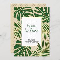 a tropical wedding card with pink and green leaves