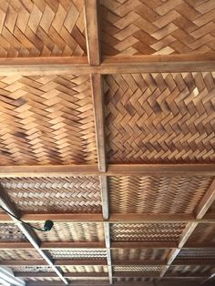 the ceiling is made out of woven wood