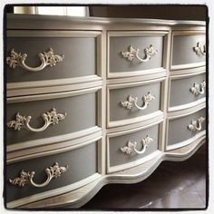 an ornate dresser with many drawers and knobs