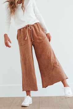 These pants are the perfect combination of comfort and style, crafted from premium cotton for a soft and luxurious feel. They feature a flattering wide-leg silhouette with an elastic waistband and a drawstring tie for a personalized fit. Ideal for any occasion, these are sure to become the most popular style in your wardrobe. Model Measurements: Hips 34” Waist 25” Bust 32” Height 5’6.5, wearing a size small 100 Cotton S: Waist 26” + Stretch Hips 40” Length 36” M: Waist 30” + Stretch Hips 41” Len Relaxed Cotton Wide-leg Bottoms, Relaxed Cotton Wide-leg Pants, Comfortable Cotton Wide Leg Pants For Fall, Comfortable Cotton Wide Leg Pants, Comfortable Cotton Wide Leg Trousers, Cotton Wide-leg Sweatpants, Relaxed Cotton Pants With Elastic Waistband, Casual Wide Leg Pants With Tie Waist, Brown Cotton Drawstring Pants