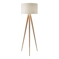 a wooden tripod floor lamp with a white shade