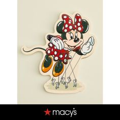 a close up of a cartoon character on a white background with the words macy's above it