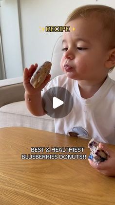 a little boy sitting at a table eating a doughnut with the words recipe written on it