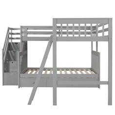 a bunk bed with stairs and drawers on the bottom level, is shown in grey