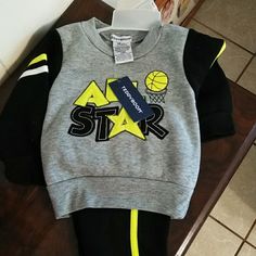 Black And Grey Writing With All Star On The Front. Black Pants With Yellow Stripe Black Cotton Playtime Sets, Black Cotton Bottoms For Playtime, Black Playwear Sets For Fall, Black Sets For Playwear In Fall, Maternity Belt, Zara Blazer, Breastmilk Storage Bags, Babydoll Lingerie, Sweatsuit Set