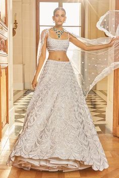 Shop for Seema Gujral Ivory Net Scallop Embroidered Lehenga Set for Women Online at Aza Fashions Ivory Lehenga, Seema Gujral, Sangeet Outfit, White Lehenga, Scallop Pattern, Floral Lehenga, Padded Blouse, Embroidered Lehenga, Lehenga Blouse