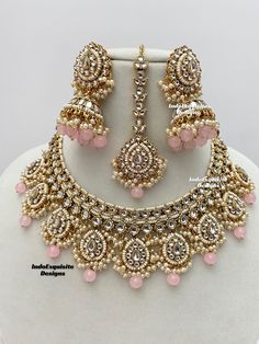 High quality elegant Kundan necklace set comes with beautiful jhumki earrings and tikka set/Kundan Polki Necklace/Reception/Wedding/bridal jewelry/ Indian jewelry /Kundan Jewelry/pink  All items are shipped from Brampton, Ontario, Canada. If you need your item by a certain day, please reach out to us for express delivery option before placing the order so that we can update the shipping for you. Standard shipping/delivery timeline Below are the delivery timeline estimates. We dispatch all orders by the next business day. ---> USA delivery timeline * 3-6 business days to major urban centers in USA. It may take 1-2 days extra to remote locations ---> Canada delivery timeline  * 2-3 business days - GTA  & Montreal  * 2-4  business days - Rest of Ontario/Quebec * 3-6 business days-  Rest of Ca Luxury Elegant Pink Kundan Necklace, Kundan Polki Necklace, Brampton Ontario, Jewelry Kundan, Kundan Necklace Set, Bride Necklace, Necklace Set Indian, Kundan Jewelry, Polki Necklace