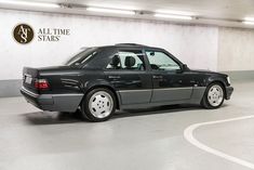 an all time stars car is parked in a parking garage with no one around it