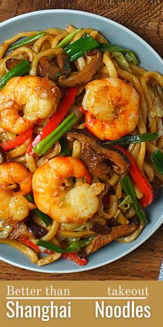 a plate full of noodles and shrimp with mushrooms on top, along with the words better than takeout shanghai noodles