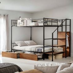 a bunk bed sitting in the middle of a living room