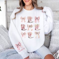 The perfect Coquette sweatshirt for those who love horses and the cowgirl lifestyle! This cute western graphic sweatshirt is right at home as a country music concert shirt, rodeo sweatshirt, or country girl shirt. Slide on your favorite jeans and cowgirl boots and head out for a night on the town. This makes a great horse girl birthday gift! Production takes 1-7 days ▸ Generally 2-3 days Standard Shipping (U.S.) 2-5 days ▸ Shipping cost $6.99 ▸ Generally 3 days Size and color information in the Horse Bleach Sweatshirt, Horse Shirts For Women, Western Bachelorette, Blank Sweatshirts, Country Girl Shirts, Horse Graphic Tee, Country Music Concerts, Horse Sweatshirts, Horse Hoodies