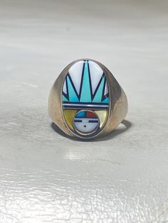 "Sun ring Zuni turquoise coral southwest MOP Mother of Pearl sterling silver women Size 11.25 Weight 13.9g Length 7/8\" Width 1/2\" Band width back of band 3/16\" Free Shipping & Free Postal Insurance Delivered in a Gift Box If you do not want the ring polished and want to leave the natural patina please let me know at the time of purchase as I do polish rings before I ship rings out. Thanks Free First Class shipping and postal insurance is included. If you want to upgrade to priority kindly Southwestern Polished Turquoise Ring Collectible, Southwestern Sterling Silver Opal Ring, Multicolor Southwestern Sterling Silver Turquoise Ring, Multicolor Southwestern Style Turquoise Ring In Sterling Silver, Multicolor Southwestern Turquoise Sterling Silver Ring, Southwestern Multicolor Turquoise Sterling Silver Ring, Sun Ring, Spoon Rings, Coral Turquoise