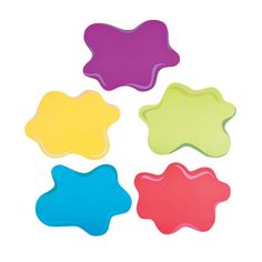 four different colored stars shaped cookie cutters