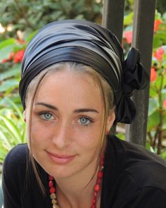 "Want to see more? My shop https://www.etsy.com/shop/SaraAttaliDesign ♥ ♥ ♥ Black Stretched Satin Turban Sinar handmade \"Mitpachat\" (Head Covering, Scarf, Tichel), fashionable and comfortable. Beautiful colors design!! For special occasion or for anytime! Our head covering will make sure you get lots of compliments The \"Mitpachat\" is about 200 cm. long and can be tied in different ways. This \"Mitpachat\" is worn for covering all hair and can be folded to show some hair. The fabrics are comf Orthodox Jewish Head Coverings, Jewish Hair Covering, Black Cotton Headscarf, Jewish Headcovering, Scarf Head Covering, Satin Turban, Messianic Head Covering, Silk Turban, Hair Snood