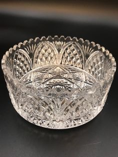 a glass bowl sitting on top of a table