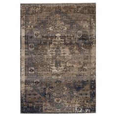 an area rug with various colors and patterns on it, including brown, blue, beige and