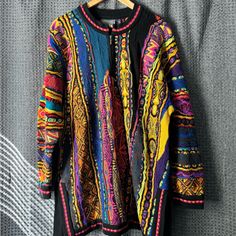 Vintage Coogi Vibrant Colored Sweater In Excellent Condition! This Iconic Piece Features A Bold, Colorful Knit Pattern With Long Sleeves And A Stylish Chest Zipper For Added Flair. The Relaxed Fit Includes Side Slits For Extra Comfort And Ease Of Movement. Known For Its High-Quality Craftsmanship, This Sweater Is A Must-Have For Collectors Or Anyone Looking To Make A Fall/ Winter Statement. Don’t Miss Out On This Rare Find! Coogi Sweater, Colorful Knit, Knit Pattern, Knit Patterns, Colorful Sweaters, Must Haves, Men Sweater, Fall Winter, Long Sleeves