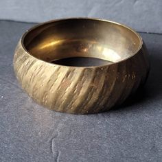 "Vintage Wide Brass Textured Bangle Bracelet Made in India Solid brass bangle Measures 2 11/16\" across (inside diameter) and is 1 1/8\" wide. Please see photos as they are part of description and show condition of pieces. Have questions? Please ask!" The Bangles, Brass Texture, Brass Bangle, Made In, Bangle Bracelet, Vintage Brass, Bracelet Making, Solid Brass, Bangle Bracelets