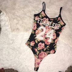 Floral Flawless Bodysuit Nwt Trendy Sleeveless Printed Bodysuit, Trendy Printed Sleeveless Bodysuit, Summer Printed Bodysuit For Loungewear, Printed Summer Bodysuit For Loungewear, Summer Printed Loungewear Bodysuit, Casual Printed One-piece Bodysuit, Black Summer Bodysuit For Loungewear, Black Letter Print Bodysuit For Summer, Casual Letter Print Bodysuit