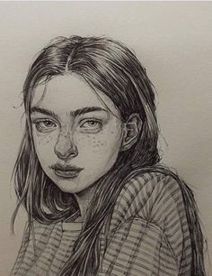 a pencil drawing of a girl with freckles on her face and shoulders, looking to the side