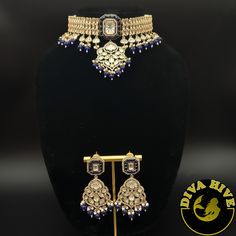 Beautiful silver foil kundan Choker with carved stones. Elevate your style with the exquisite Diva necklace and earring set, exclusively available at our luxury Indian jewelry store. Made with the finest materials, this set is a true reflection of Elegance and glamour, designed to take your look to new heights. Each piece in the set is meticulously crafted to ensure superior quality and attention to detail. The necklace and earring set is the perfect addition to your collection offering versatil Luxury Stone Work Jewelry Sets For Festive Occasion, Luxury Blue Jewelry With Intricate Design, Luxury Kundan Jewelry Sets With Intricate Design, Luxury Kundan Jewelry Sets For Festive Occasions, Luxury Gold Jewelry Sets With Stone Work, Blue Fusion Jewelry With Intricate Design, Luxury Jewelry Sets For Gifting During Festive Season, Luxury Kundan Chandbali Jewelry, Luxury Kundan Jewelry With Stone Work