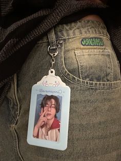 the back of a person's jeans with a keychain attached to it