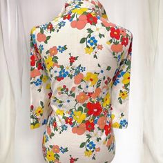 Stunning early sixties Ruth Barry top  * All cotton * Front button closure with pearlized buttons * 3/4 sleeves * Vibrant flower power pattern on white base * Gorgeous vintage condition - no flaws to note * Best fits modern Medium  Chest:  19" across Length:  23" 💛Favorite for discount💛 Please consult the item description in its entirety to ensure that your purchase will be a forever vintage love! Questions? Send me a message! I'm happy to relay extra measurements, photos, or anything you'd like. Red Swim Trunks, Love Questions, Surf Shorts, Long Maxi Skirts, Brown Top, Vibrant Flower, Beautiful Skirts, Collared Shirt, Vintage Love