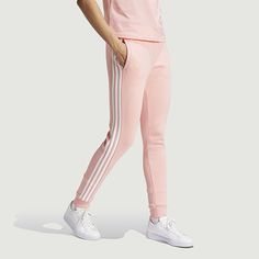 So comfortable, you'll wonder what you wore before. These adidas sweat pants are made from a cozy cotton-blend fleece that feels extra soft against the skin. Cut for a close, tapered fit through the legs, they team easily with all types of footwear, from low-top sneakers to socks and slides. We partner with better cotton to improve cotton farming globally. Better cotton makes global cotton production better for the people who produce it, better for the environment it grows in, and better for the Athleisure Loungewear Bottoms With Side Stripes, Adidas Athleisure Joggers For Loungewear, Adidas Casual Joggers With Side Stripes, Adidas Sporty Relaxed Fit Joggers, Athleisure Joggers With Side Stripes For Loungewear, Athleisure Activewear With Three Stripes For Lounging, Spring Cotton Sweatpants With Side Stripes, Adidas Sweatpants For Loungewear, Athleisure Style, Adidas Sweatpants For Loungewear In Athleisure Style