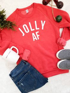 Are you Jolly AF for the holidays... well then this sweatshirt has your name all over it 50/46/4 polyester (6.25% recycled)/cotton (6.25% organic)/rayon, 30 singles Slim fit Low-impact dyed and washed Raglan sleeves Wash on Cold Inside out to preserve the life of the garment Mama Bear Hoodie, Holiday Sayings, Jolly Af, Mama Hoodie, Wallet Minimalist, Homemade Holiday, Mom Hoodies, Mens Wallet, Xmas Sweater