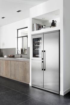 an image of a kitchen with stainless steel appliances