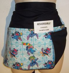 a women's skirt with an image of pooh bear on the front and sides