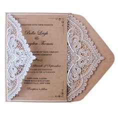 wedding card with lace on the front and bottom, in brown paper envelopes are shown