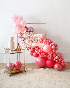 balloons and candles are arranged on a table