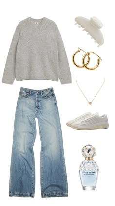 a woman's outfit including jeans, sneakers and jewelry