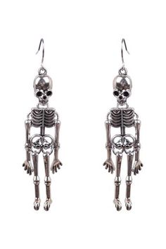 a pair of silver skeleton earrings on a white background with clippings to the side