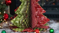 a decorated christmas tree sitting on top of a table