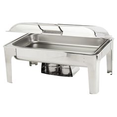 the stainless steel chafer is ready to be served with two glasses on each side