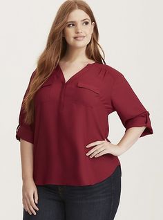 Monday-Friday dressing just got that much easier. A rich cardinal georgette blouse is easy to throw on (but so comfy it's hard to take off! ). 3/4 tab sleeves, a Mandarin collar and double pockets lend polish to the easy look. Model is 5’10”, size 1. Size 1 measures 29 3/4” from shoulder. Polyester. Wash cold, dry low. Imported plus size blouse. The best plus size women's harper georgette pullover 3/4 sleeve blouse the in beet red made of georgette. These dressy clothes and work-wear, office-wea Fall Office Blouse With Rolled Sleeves, Versatile Blouse With Roll-up Sleeves For Fall, Fall Blouse With Rolled Sleeves, Versatile Blouse With Rolled Sleeves For Fall, Fall Versatile Blouse With Rolled Sleeves, Fall Tops With Rolled 3/4 Sleeves, Fall Top With Rolled 3/4 Sleeves, Versatile 3/4 Sleeve Blouse For Fall, Fall Rolled 3/4 Sleeve Tops