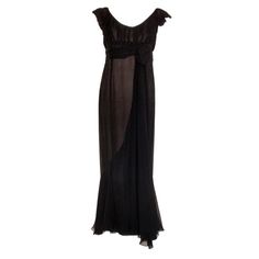 This is a gorgeous vintage long black chiffon gown by Helen Rose, from the 1950's. The gown has short cap sleeves, empire waist, a zipper up the back, and a flowing skirt. Measurements: Length (Shoulder to hem): 53" Bust: 32" Waist: 29" Hip: 34" Yellow Evening Dress, Long Red Evening Dress, Famous Wedding Dresses, Gothic Gowns, Helen Rose, Rose Costume, 1950s Fashion Women, Red Evening Gown, Long Black Evening Dress