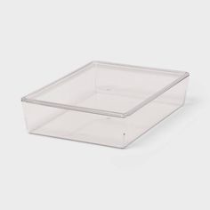 a clear plastic container on a white background