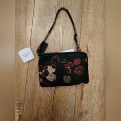 Nwt Coach Large Gold/Midnight Corner Zip Wristlet Black Dreamy Land Floral Print Chic Evening Bag With Wrist Strap, Evening Rectangular Wristlet With Wrist Strap, Evening Bags With Wrist Strap, Evening Clutch Wristlet, Evening Clutch With Wrist Strap, Evening Pouch With Adjustable Strap, Chic Evening Wristlet With Wrist Strap, Party Wristlet With Wrist Strap, Coach Evening Pouch Clutch